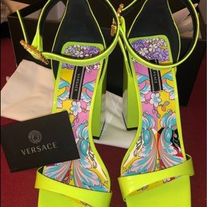 Lime green Versace sandals.